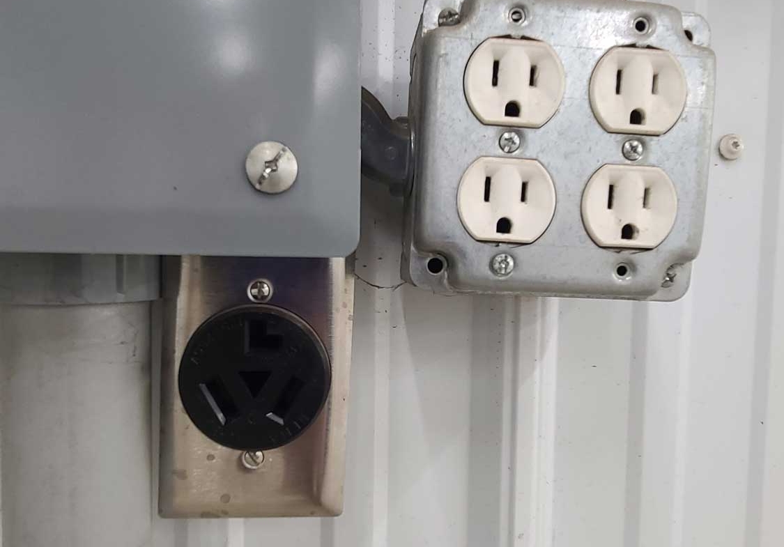 220v electrical outlet plug-in that is part of a commercial property for lease.