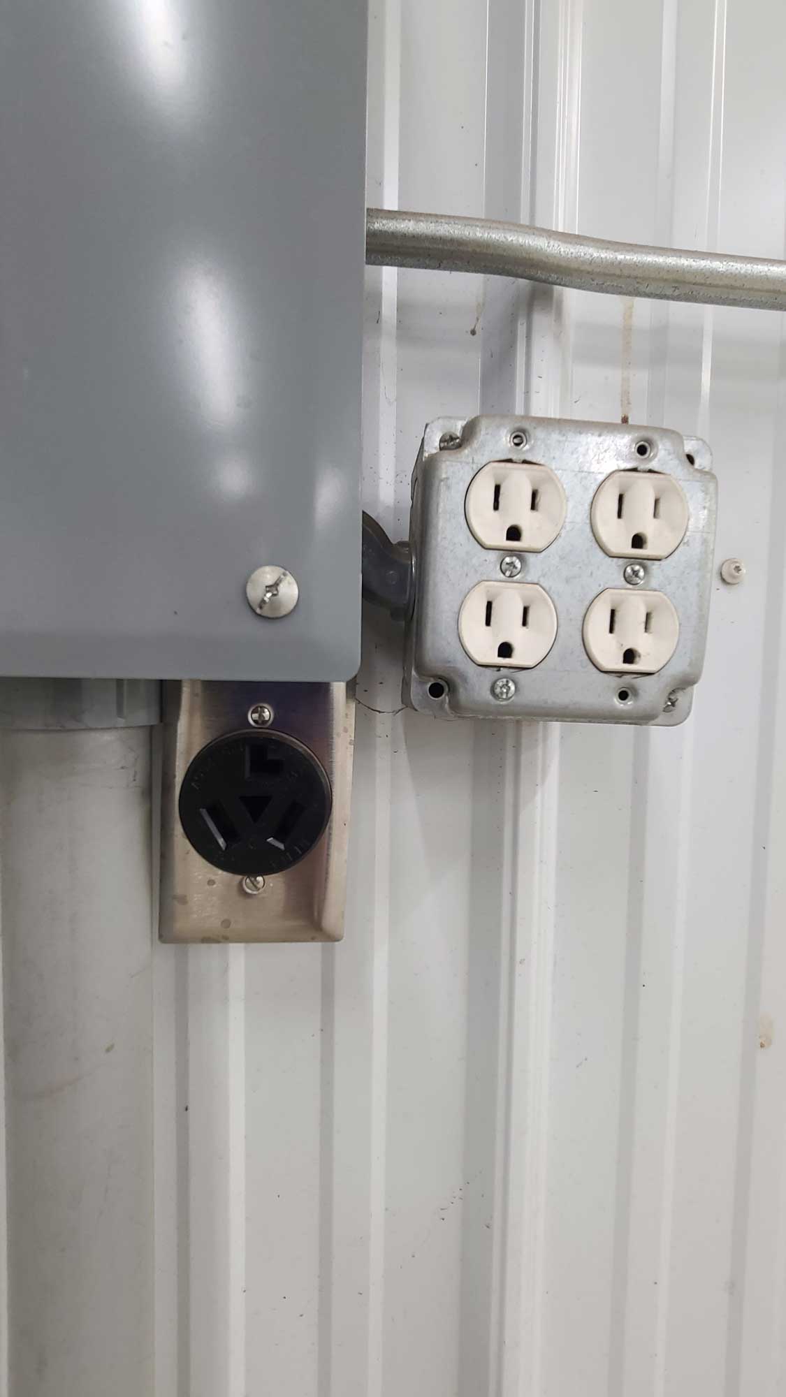 220v electrical outlet plug-in that is part of a commercial property for lease.