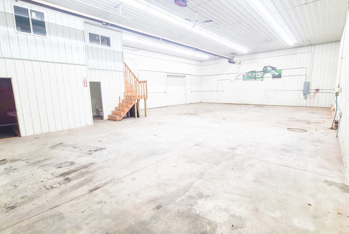 Small warehouse space for rent near me with floor drain.