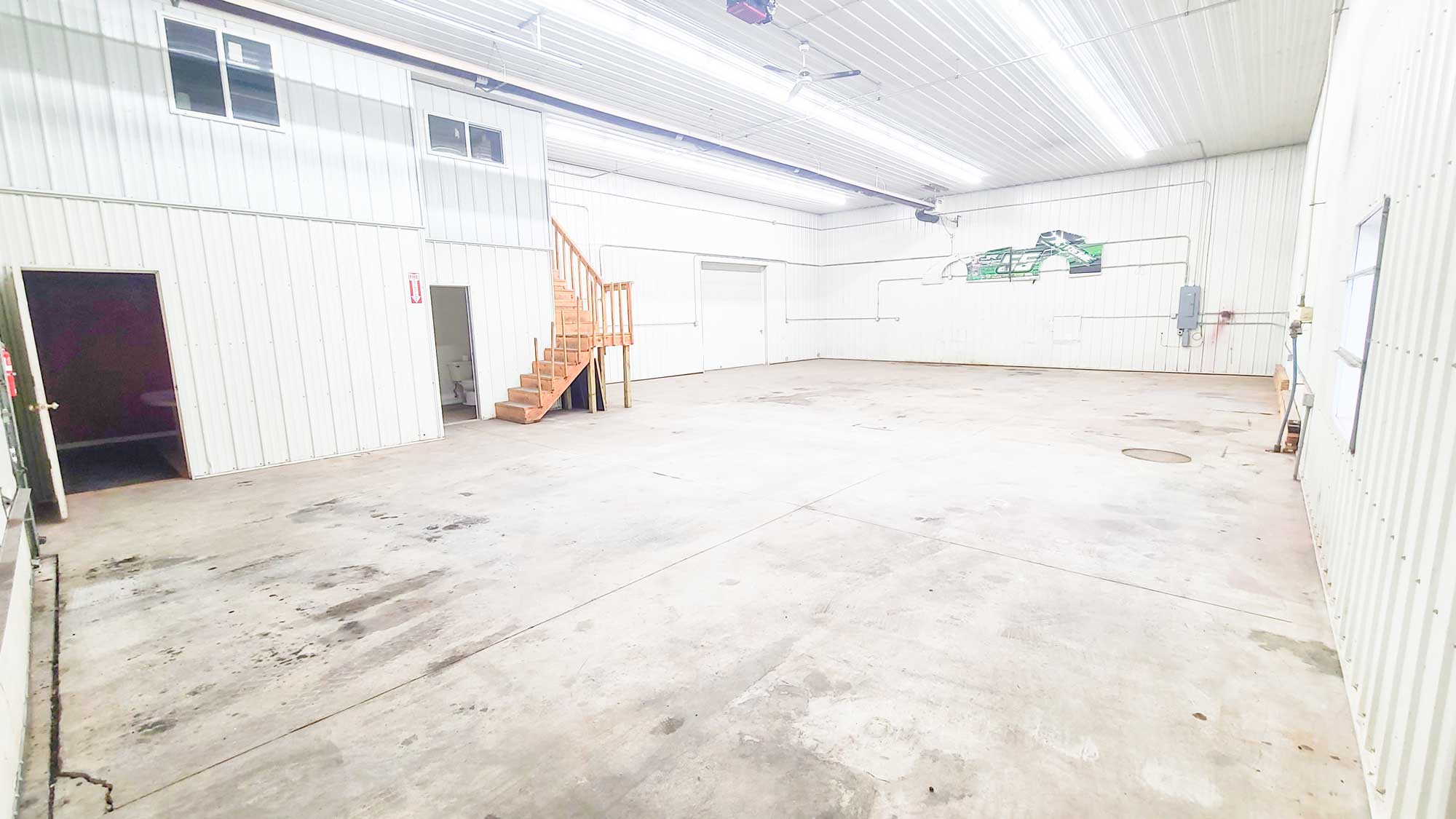 Small warehouse space for rent near me with floor drain.