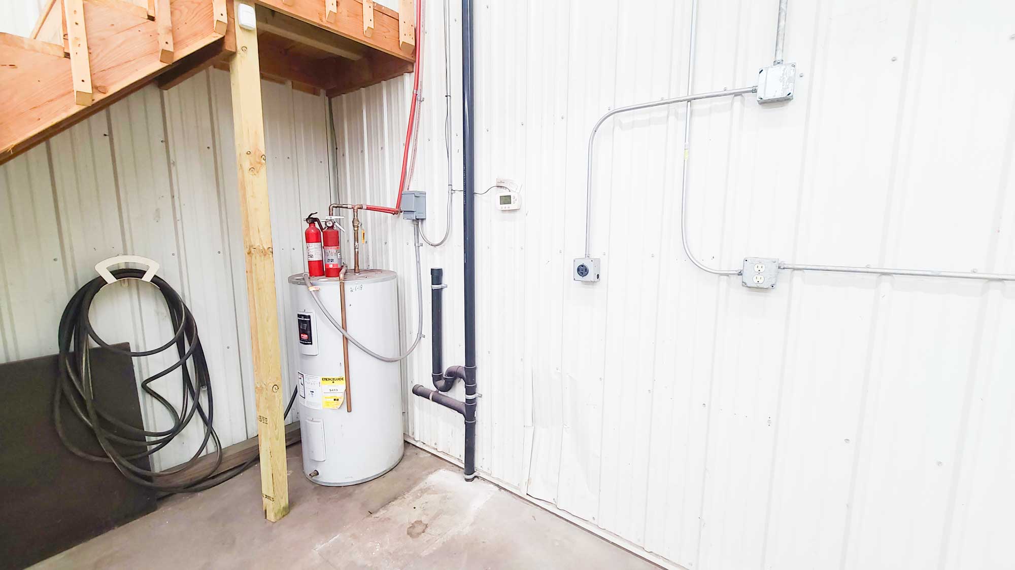 Water heater and laundry sink hookups.