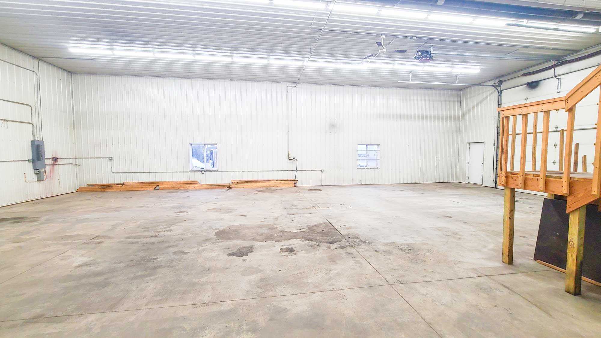 Small commercial space for rent that is used for contractor workshop or storage.