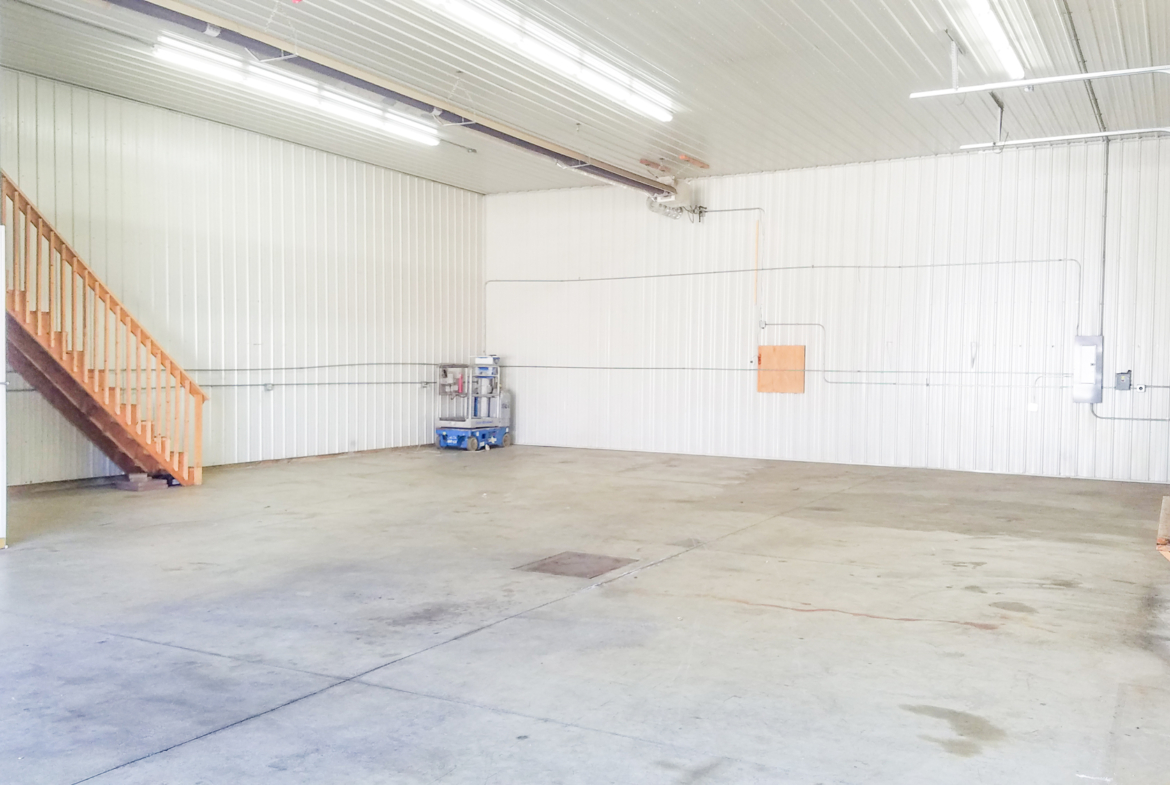 Steel lined walls in a warehouse suite for lease near me.