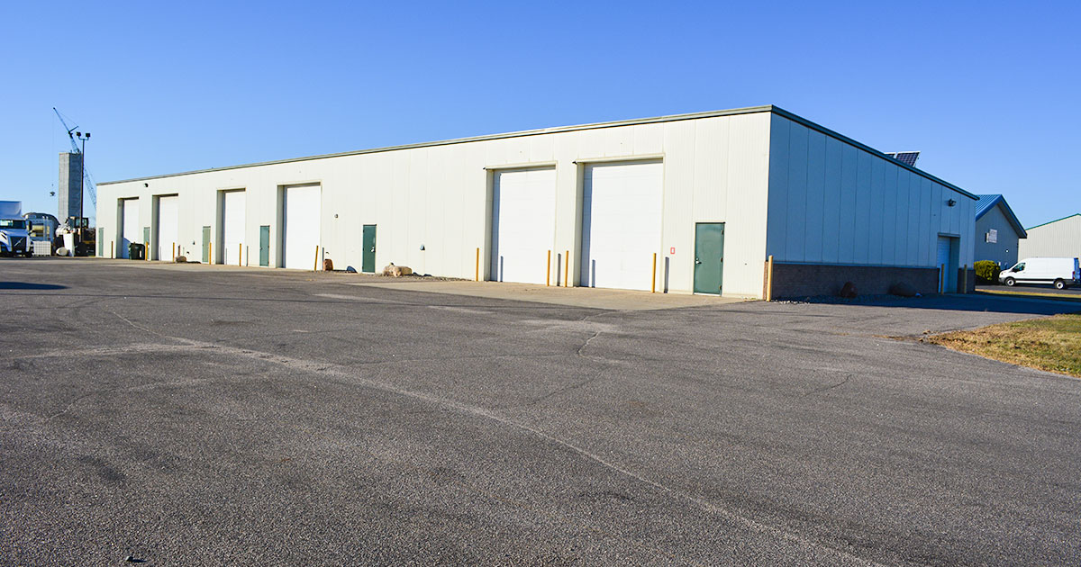 Steel multi tenant warehouse building for sale or lease.